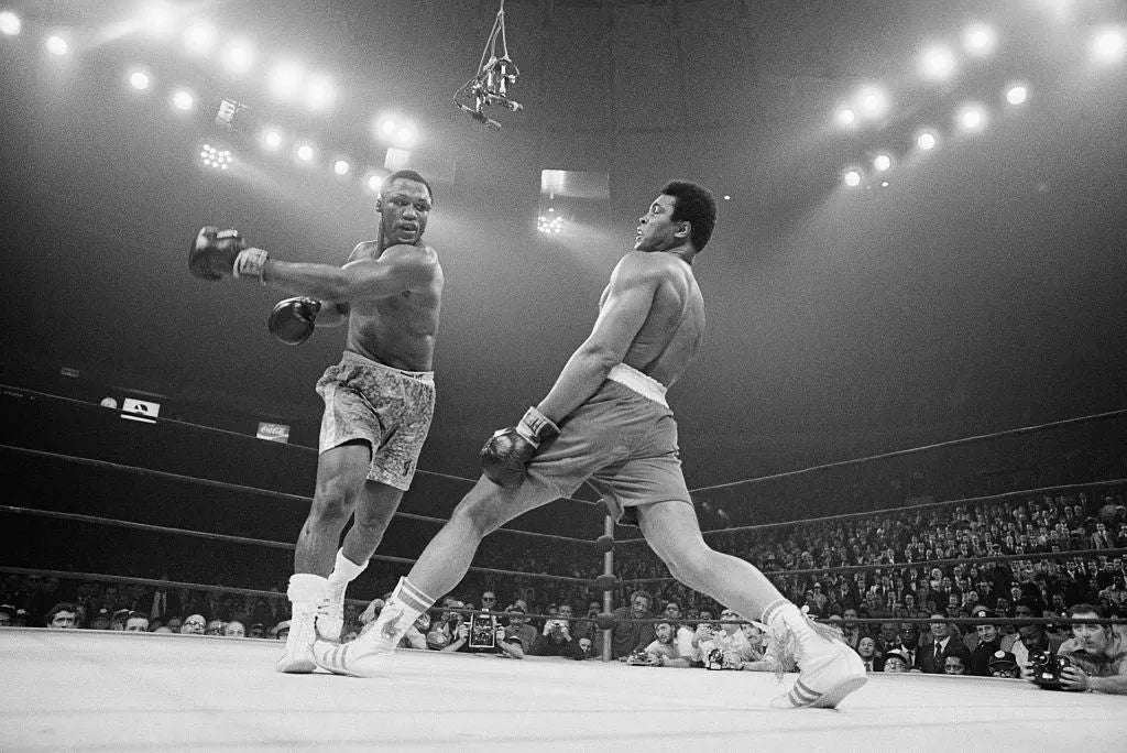 Muhammad Ali Dodging a Punch From Frazier