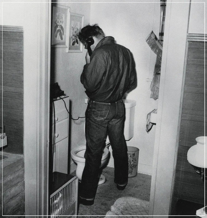 “James Dean In Restroom” by Frank Worth