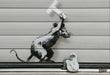 Padlock Rat Brexit Artwork, Heathrow 2019  by Banksy's Graffiti