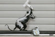 Padlock Rat Brexit Artwork, Heathrow 2019  by Banksy's Graffiti
