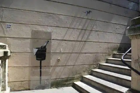 Champagne Rat Paris, 2021 by Banksy's Graffiti