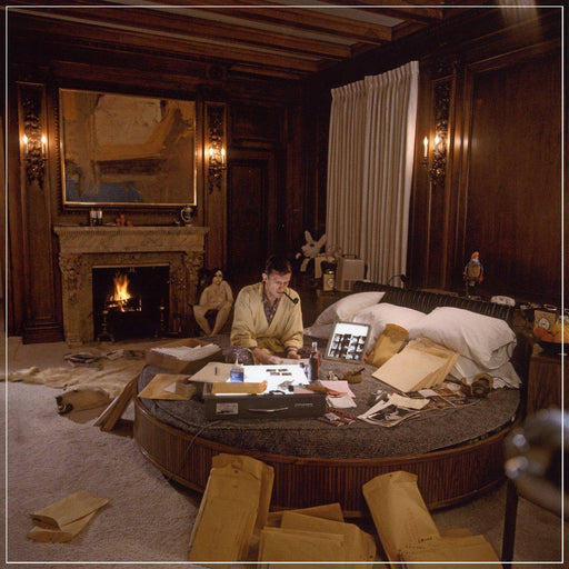 "Hef on Round Bed" featuring Hugh Hefner by Larry Gordon, January 1966