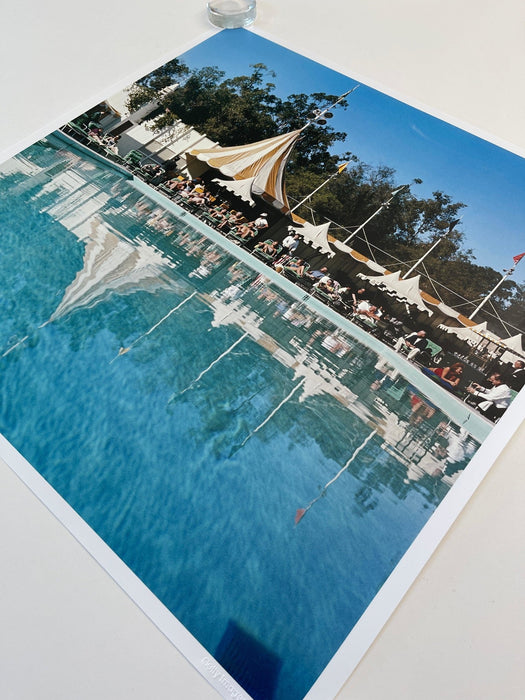 Beverly Hills Hotel Pool 24"x 24" Unframed C-print by Slim Aarons - Slim Aarons