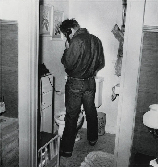 “James Dean In Restroom” by Frank Worth