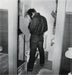 “James Dean In Restroom” by Frank Worth