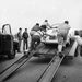 "James Dean, Pushing Porsche On Trailer" by Frank Worth