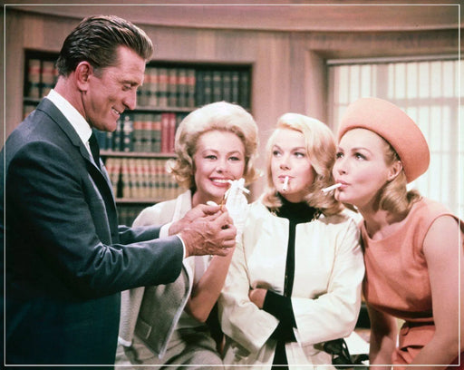 “Kirk Douglas Lighting Cigarettes, Color” by Frank Worth