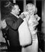 “Marilyn Monroe and Ciro's Owner Herbert Hover” by Frank Worth